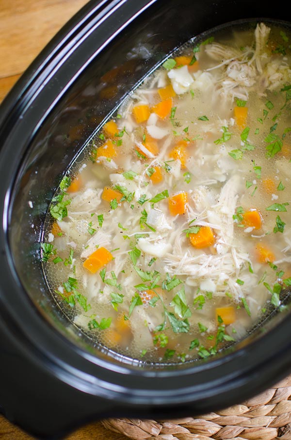 Make a budget-friendly and simple slow cooker chicken noodle soup for a healthy dinner. | livinglou.com