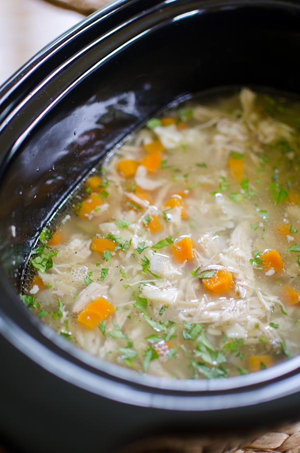 Make a budget-friendly and simple slow cooker chicken noodle soup for a healthy dinner. | livinglou.com