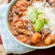 Slow cooker chicken quinoa chili is the perfect winter dish with sweet potatoes, black beans and tomatoes. | livinglou.com