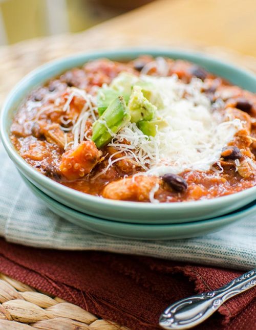 Slow cooker chicken quinoa chili is the perfect winter dish with sweet potatoes, black beans and tomatoes. | livinglou.com