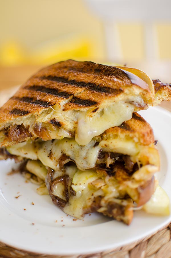 A gooey grilled cheese sandwich made with caramelized onions, green apple and horseradish. | livinglou.com