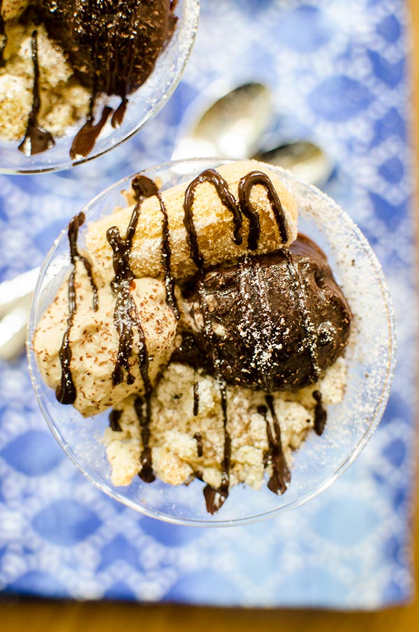 Tiramisu pudding parfaits are the perfect quick dessert with coffee whipped cream, lady finger cookies and chocolate pudding. | livinglou.com