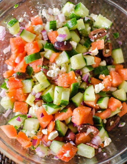Greek watermelon feta salad is a refreshing summer salad with a lime vinaigrette and fresh mint. | livinglou.com