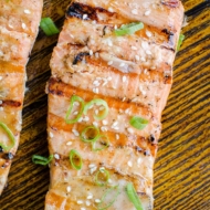 Grilled salmon with a Dijon and maple syrup marinade is the perfect and simple way to grill fish this summer. | livinglou.com