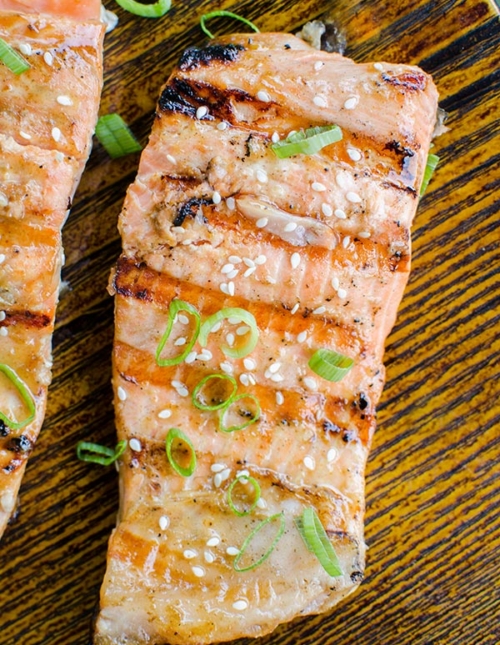 Grilled salmon with a Dijon and maple syrup marinade is the perfect and simple way to grill fish this summer. | livinglou.com
