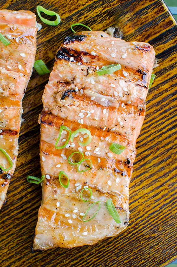 Grilled salmon with a Dijon and maple syrup marinade is the perfect and simple way to grill fish this summer. | livinglou.com