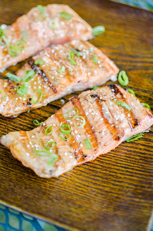 Grilled salmon with a Dijon and maple syrup marinade is the perfect and simple way to grill fish this summer. | livinglou.com