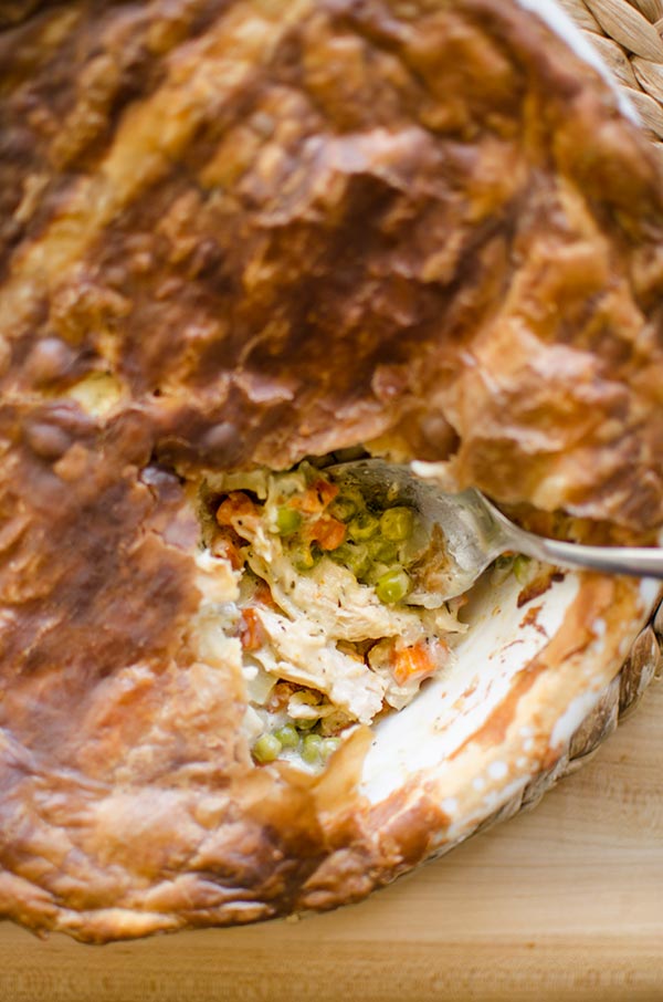 Turn Thanksgiving leftovers into a delicious turkey pot pie with carrots, parsnips, peas and a delicious and easy puff pastry crust.