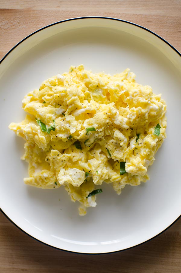 Elevate your breakfast with a restaurant worthy recipe for truffled scrambled eggs made with truffled Monterey Jack cheese and green onions. | LivingLou.com