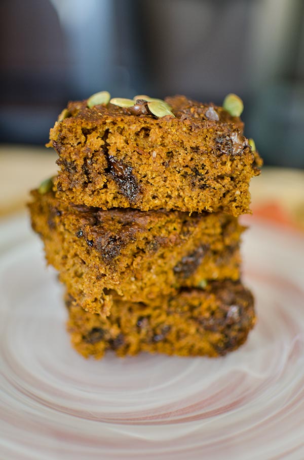 Whole wheat pumpkin chocolate chip bars are so light and fluffy you won't even believe they are made with whole wheat flour! | livinglou.com