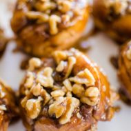 Use store-bought croissants for a simple hack for gooey cinnamon buns with a sticky, walnut topping. | livinglou.com