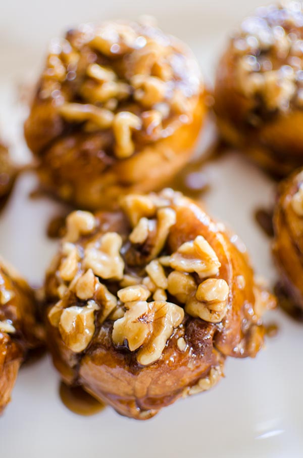 Use store-bought croissants for a simple hack for gooey croissant cinnamon buns with a sticky, pecan topping. | livinglou.com