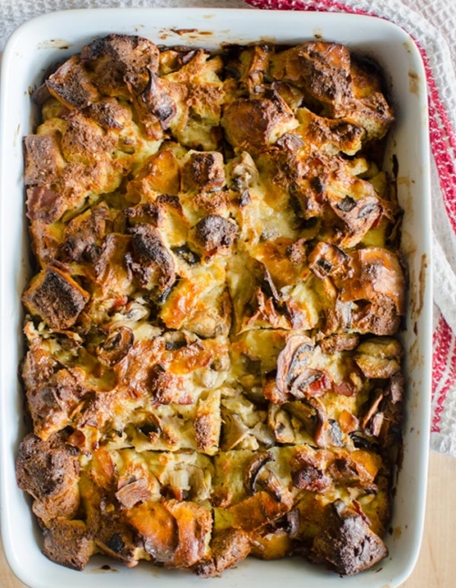 Serve the ultimate holiday brunch with this no-fuss and simple recipe for overnight smoked cheddar, bacon and mushroom strata. | livinglou.com