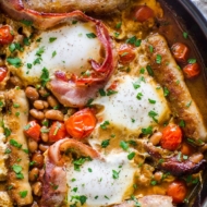 A full English breakfast in a frying pan.
