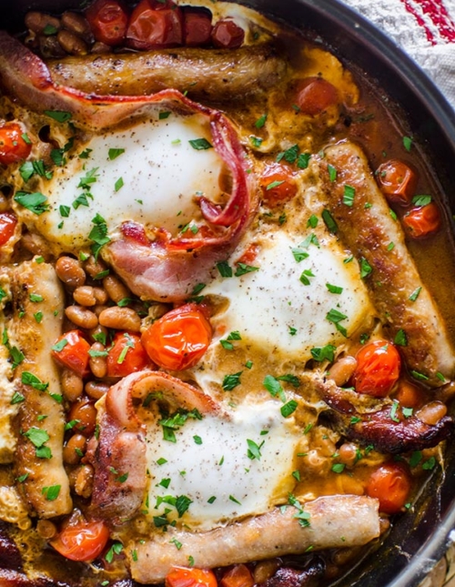 A full English breakfast in a frying pan.