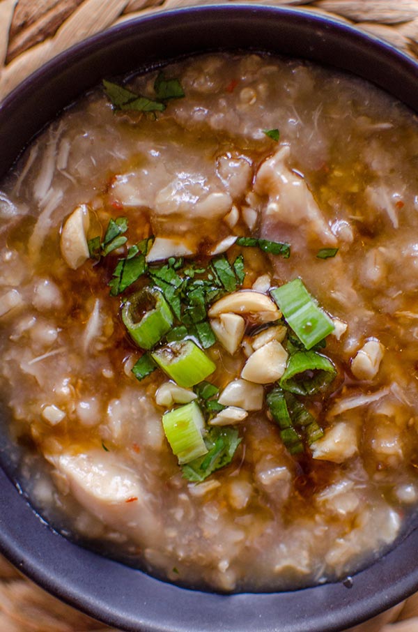 Make slow cooker brown rice chicken congee for the perfect comfort food this winter, loaded with fresh ginger. | livinglou.com