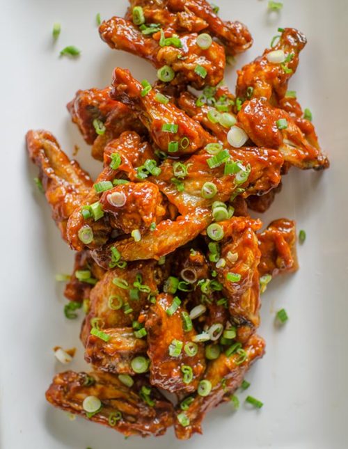 Korean-inspired chicken wings baked in the oven with a gochujang sauce. | livinglou.com