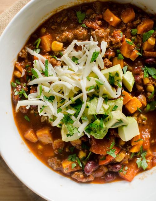The best homemade chilli with beer recipe that is perfect for the Super Bowl or any night of the week! | livinglou.com