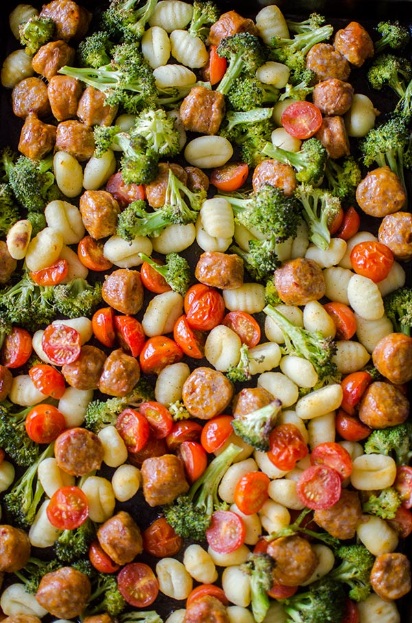 Sheet pan oven baked gnocchi with sausage and vegetables is a quick dinner made in one pan. | livinglou.com