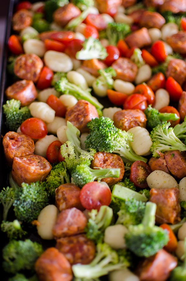 Sheet pan oven baked gnocchi with sausage and vegetables is a quick dinner made in one pan. | livinglou.com