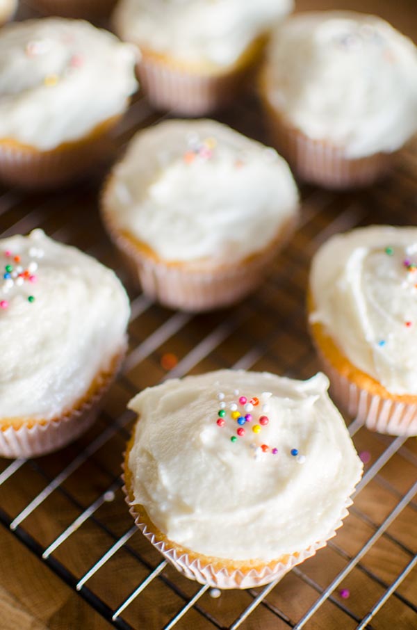 The easiest homemade cupcakes in the world with simple vanilla frosting. | livinglou.com