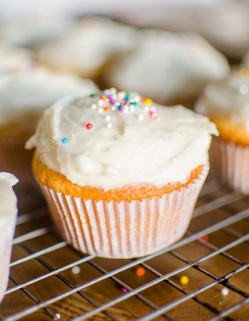 The easiest homemade cupcakes in the world with simple vanilla frosting. | livinglou.com