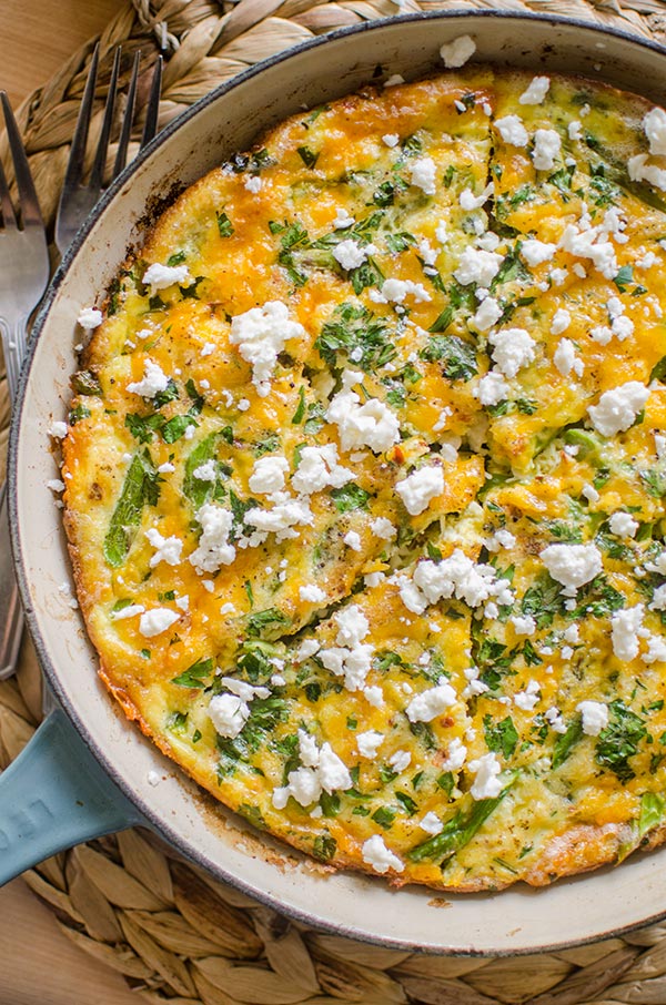 Bacon and asparagus frittata topped with feta.