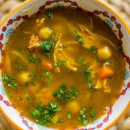 Moroccan chicken soup in a colourful bowl.