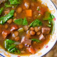 Slow cooker lentil and ham soup in a bowl.