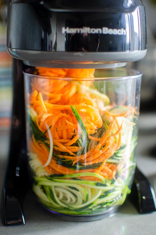 Closeup of hamilton beach 4-in-1 spiralizer in action