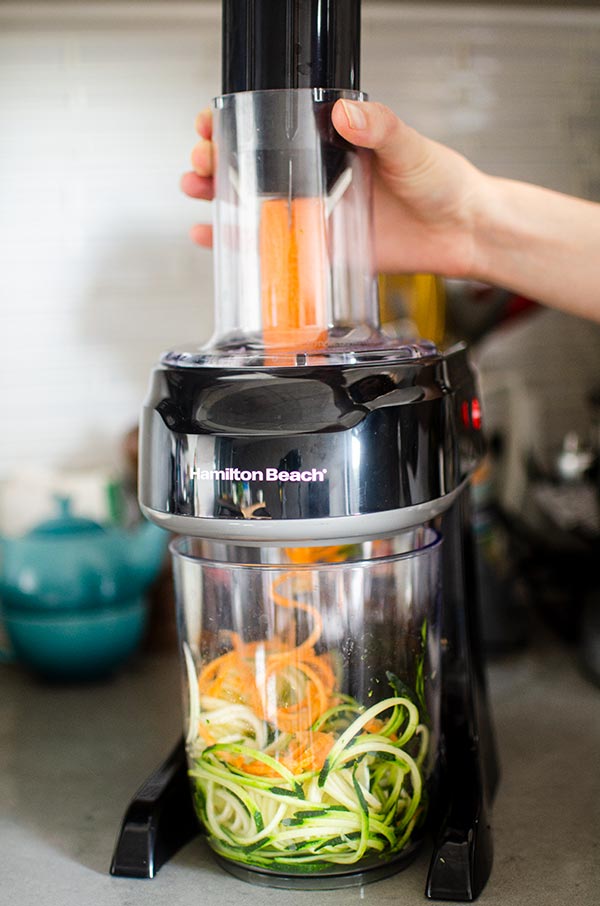 Hamilton beach 4-in-1 electric spiralizer spiralizing zucchini and carrots into noodles