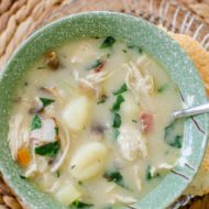 Chicken gnocchi soup in a green bowl