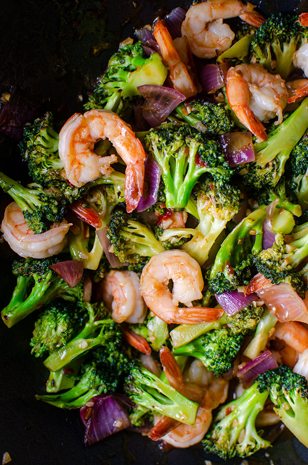 Shrimp and broccoli stir fry in a wok