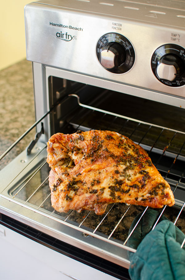 Cooked turkey breast coming out of the Hamilton Beach Air Fryer