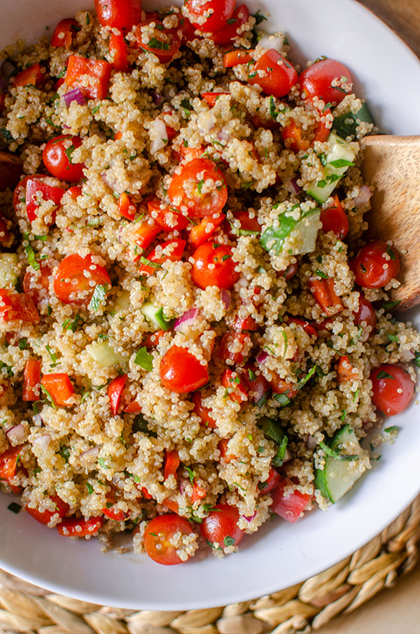 closeup of quinoa salad in a white bowl