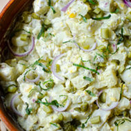 Potato salad in a wooden bowl