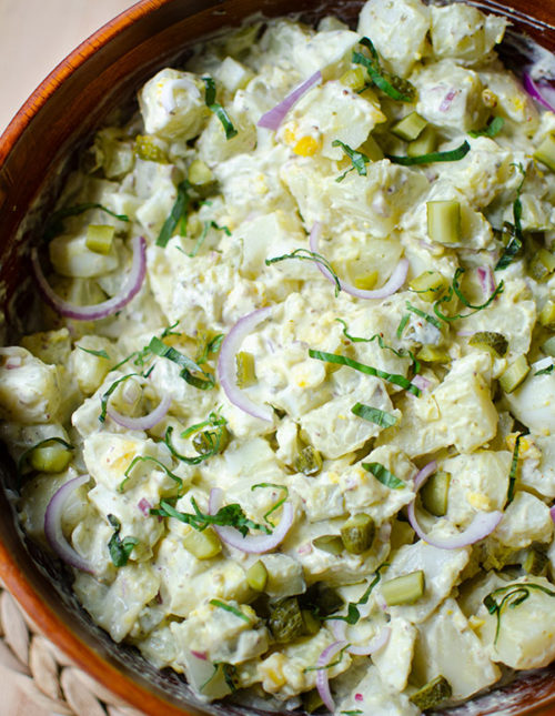 Potato salad in a wooden bowl