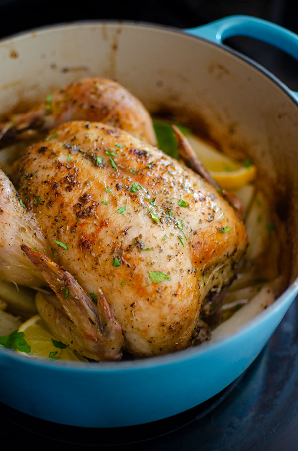 Closeup of whole chicken in the pot