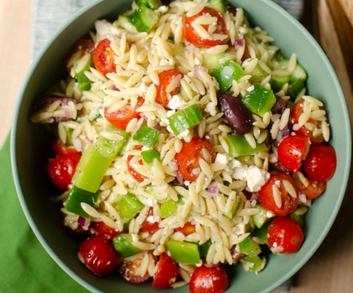 Serving bowl of orzo salad