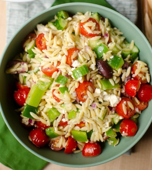 Serving bowl of orzo salad