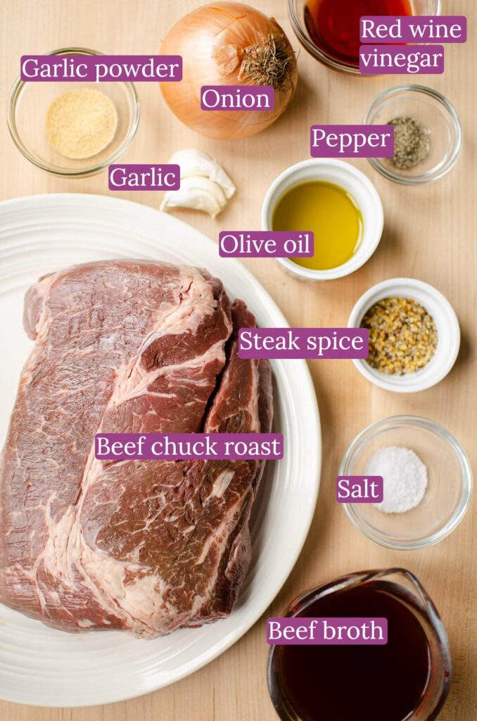 Ingredients for pulled beef on a table.