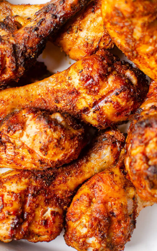Closeup of chicken in a white dish.